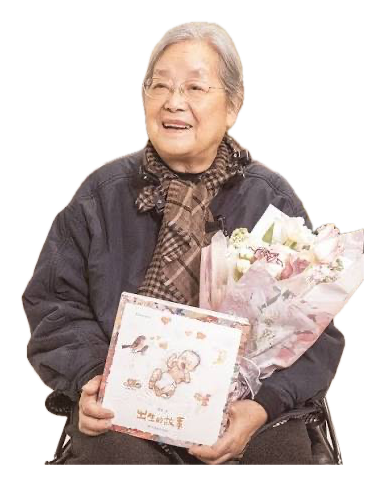 Illustrator Cai Gao smiling, holding flowers and her picture book 出生的故事